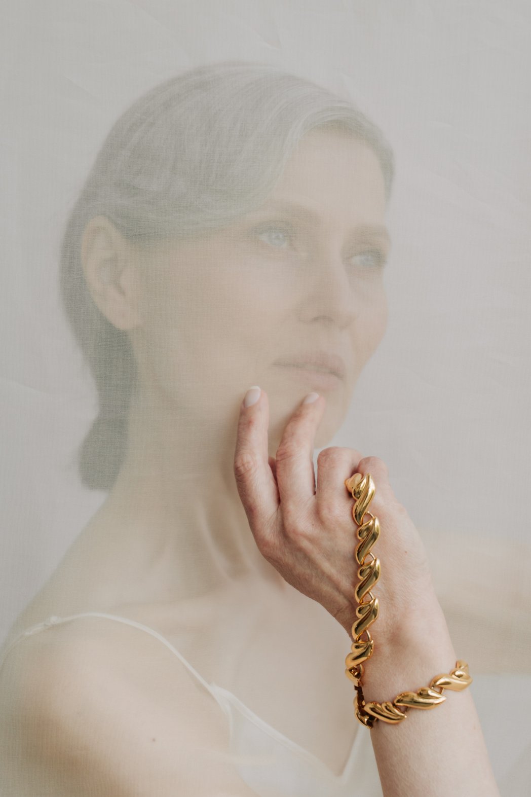 Senior Woman Wearing a Gold Bracelet